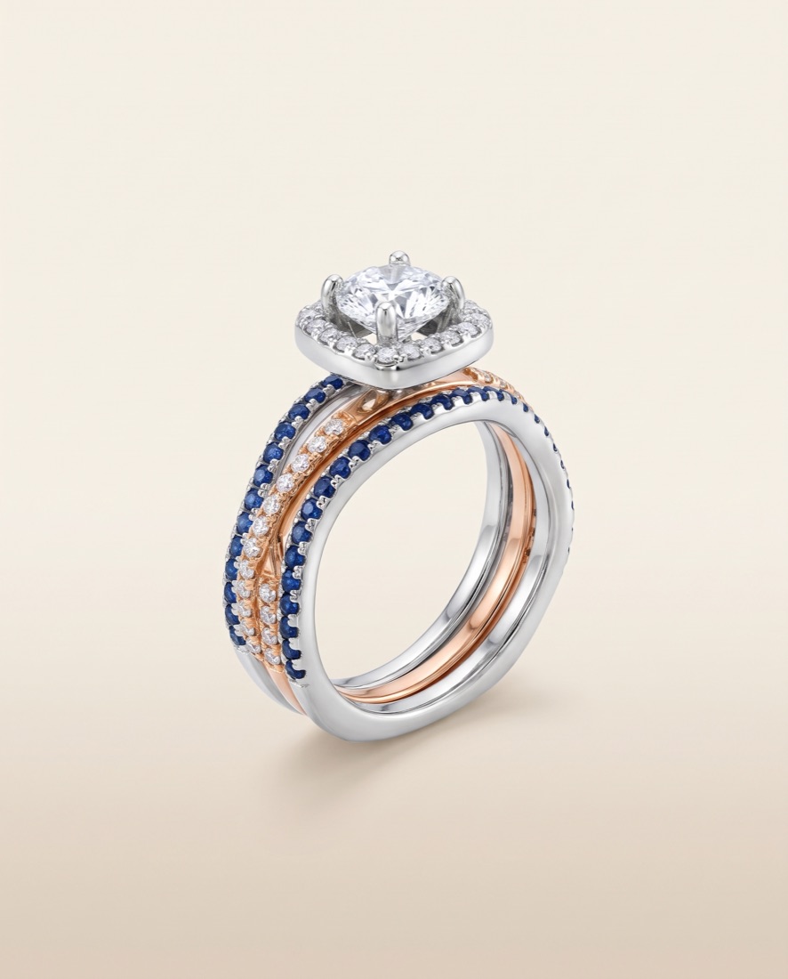 Anillo de compromiso con halo en oro blanco y rosado, con zafiros y diamantes